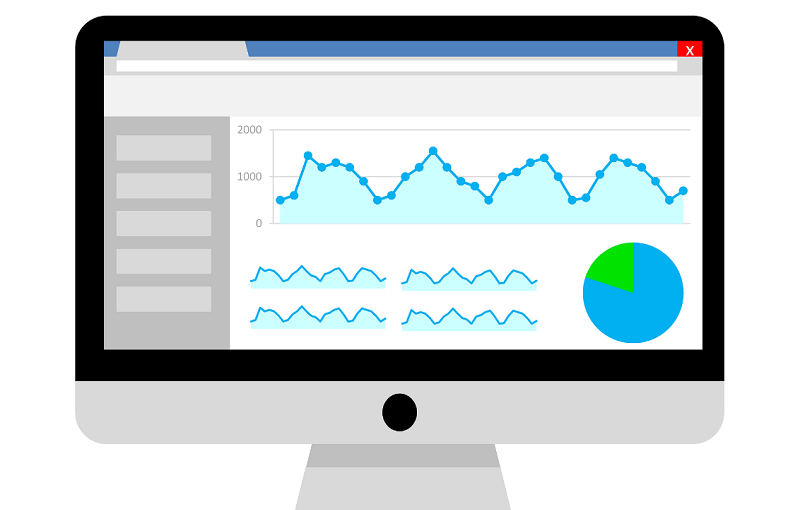 Illustration of a computer monitor showing blue and green charts of a website’s SEO statistics and trends