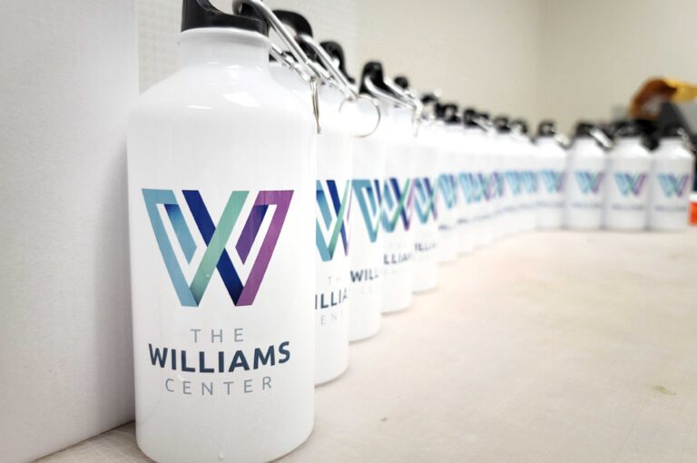 white aluminum water bottles with the Williams Center logo and a black cap