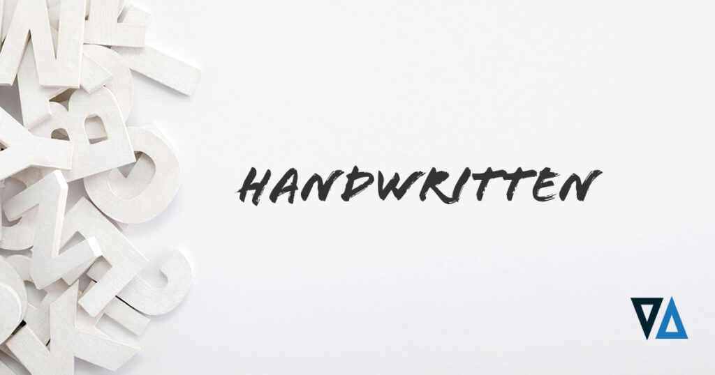 white, block letters piled up next to black letters spelling the word handwritten