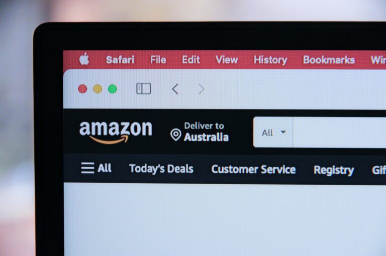 closeup of a black laptop with Amazon opened in a Safari browser