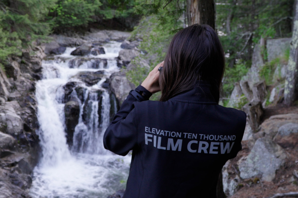 Elevation Ten Thousand film crew at waterfall location